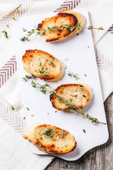 Fried bread croutons with thym