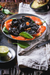 Black ravioli with salted salmon