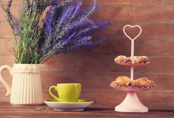 Cup of coffee and cookies with lavender