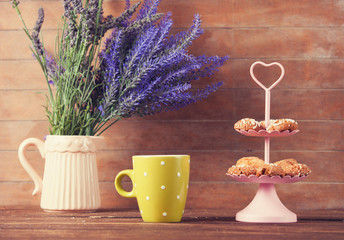 Cup of coffee and cookies with lavender