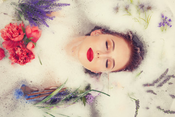 girl in the bathroom with flowers