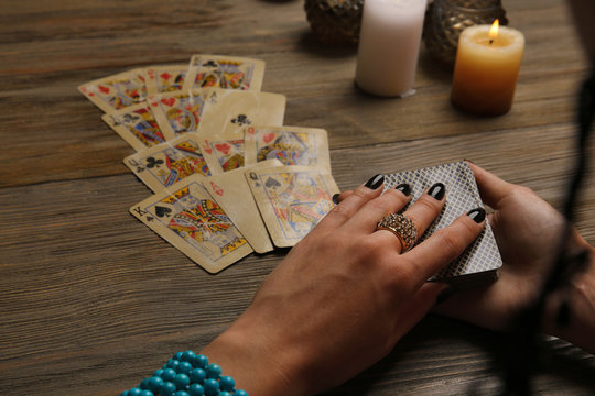 Witch - fortune teller reading fortune close up