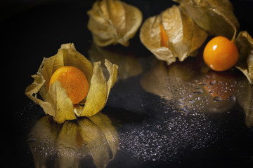 Whole and sliced physalis