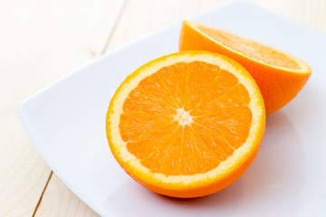 Fototapeta na wymiar Orange cut in half