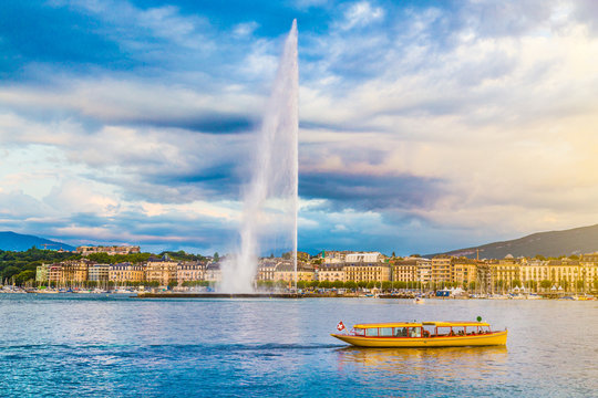 City of Geneva with famous Jet d'Eau fountain at sunset, Switzerland