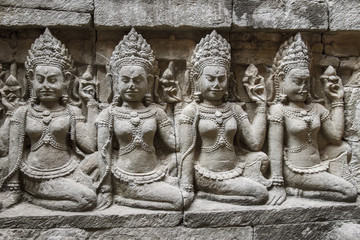 Apsara carvings status on the wall of Angkor temple, world herit