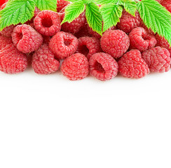 Ripe raspberries with leaves close-up isolated on a white background