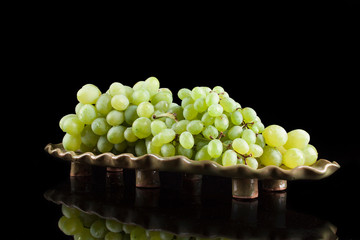 White grapes on a black background