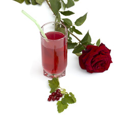 glass of juice red rose and currant