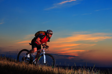 Naklejka premium Mountain Bike cyclist riding outdoor