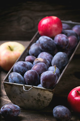 Plums and apples