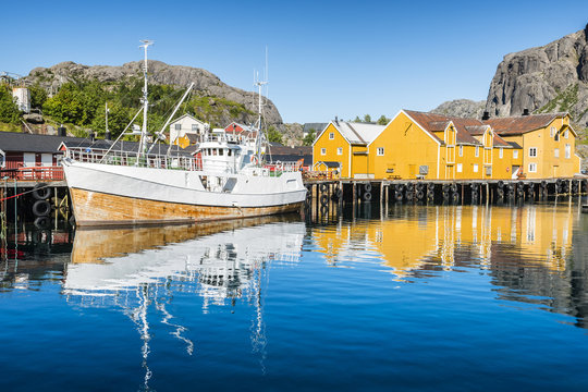 Fishing boat moored in the fishing port. Nusfjorden, Lofoten arcghipelago.