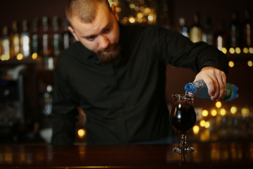 Bartender making cocktail