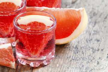 Red grapefruit cocktail, selective focus