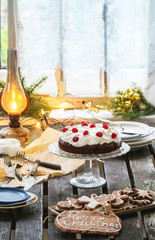 Table setting with chocolate cake
