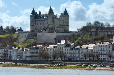 Fototapeta na wymiar Saumur castle on Loire river (France) spring view.