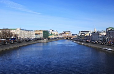 Fototapeta na wymiar Moscow view on river from bridge streets buildings