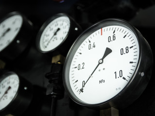 pressure gauges in the old steam locomotive. Shallow depth of field.