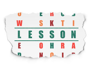 Education concept: word Lesson in solving Crossword Puzzle