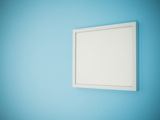 Blank white frame on light blue wall background
