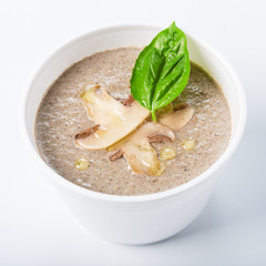 Hot food delivery - mushroom soup isolated