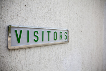 visitors sign