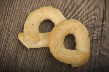 Taralli on the wood table,Traditional Italian snack from Puglia