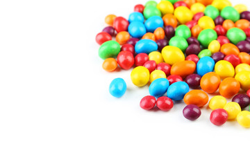 Colorful candies on white background