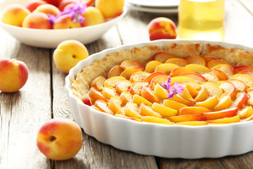 Apricot pie on grey wooden background