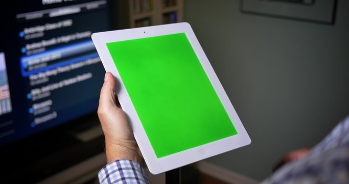 4K Man with Tablet PC Green Screen at Home
