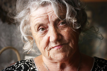 Granny face on a dark background