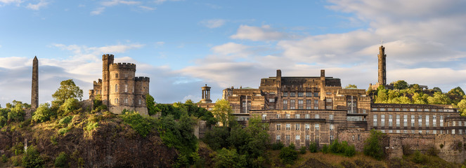 Roman ruins and castle on top of Calton Hill in Edinburgh, Scotland. - obrazy, fototapety, plakaty
