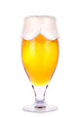 Frosty glass of light beer isolated