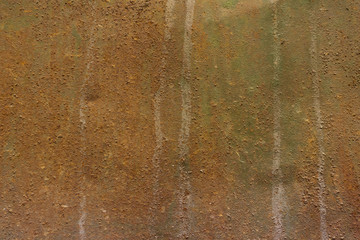brown metal rusty texture. brutal background in greyish-brown tints. smudges on old rusty wall.