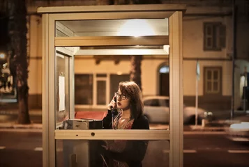 Foto op Plexiglas telephone box in the night © olly