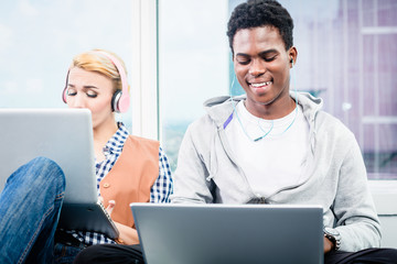 Hacker in tech start-up business coding software