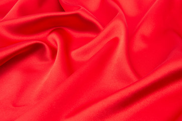 red satin or silk fabric as background