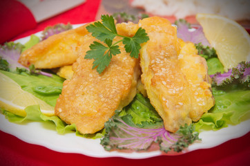 Delicious spiced catfish escalope in sesame