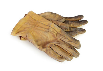 Old used working gloves, isolated on pure white background.