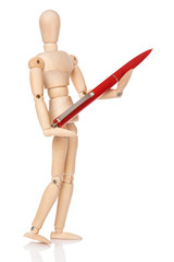 Small wooden dummy and ballpoint pen