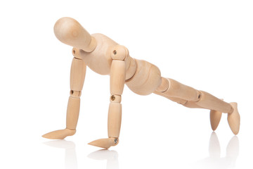 Small wooden dummy during push ups