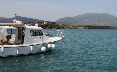 White boat at blue sea