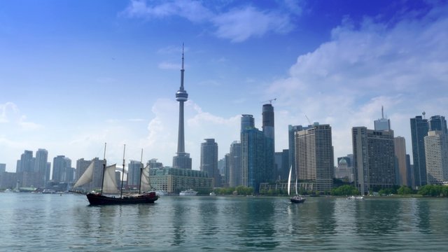 4K Toronto Skyline from Lake Ontario with Tall Ships and CN Tower