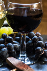 red wine in glass with grapes