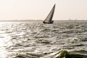 Fototapeta na wymiar sailing yacht in the open ocean