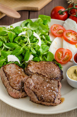 Beef steak with salad