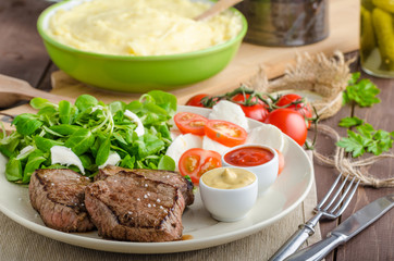 Beef steak with salad