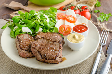 Beef steak with salad