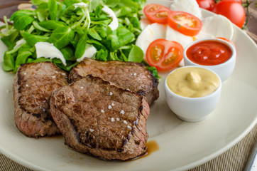 Beef steak with salad