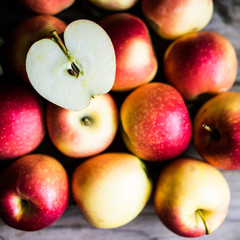 Apples on rustic wooden background